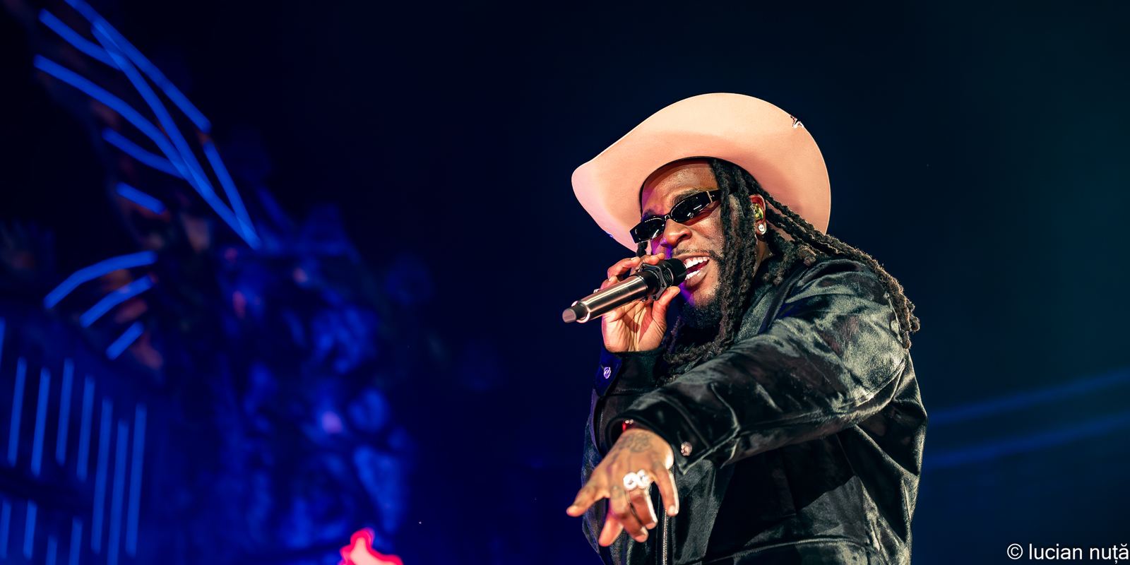 Burna Boy performing on stage at the Untold festival in 2024