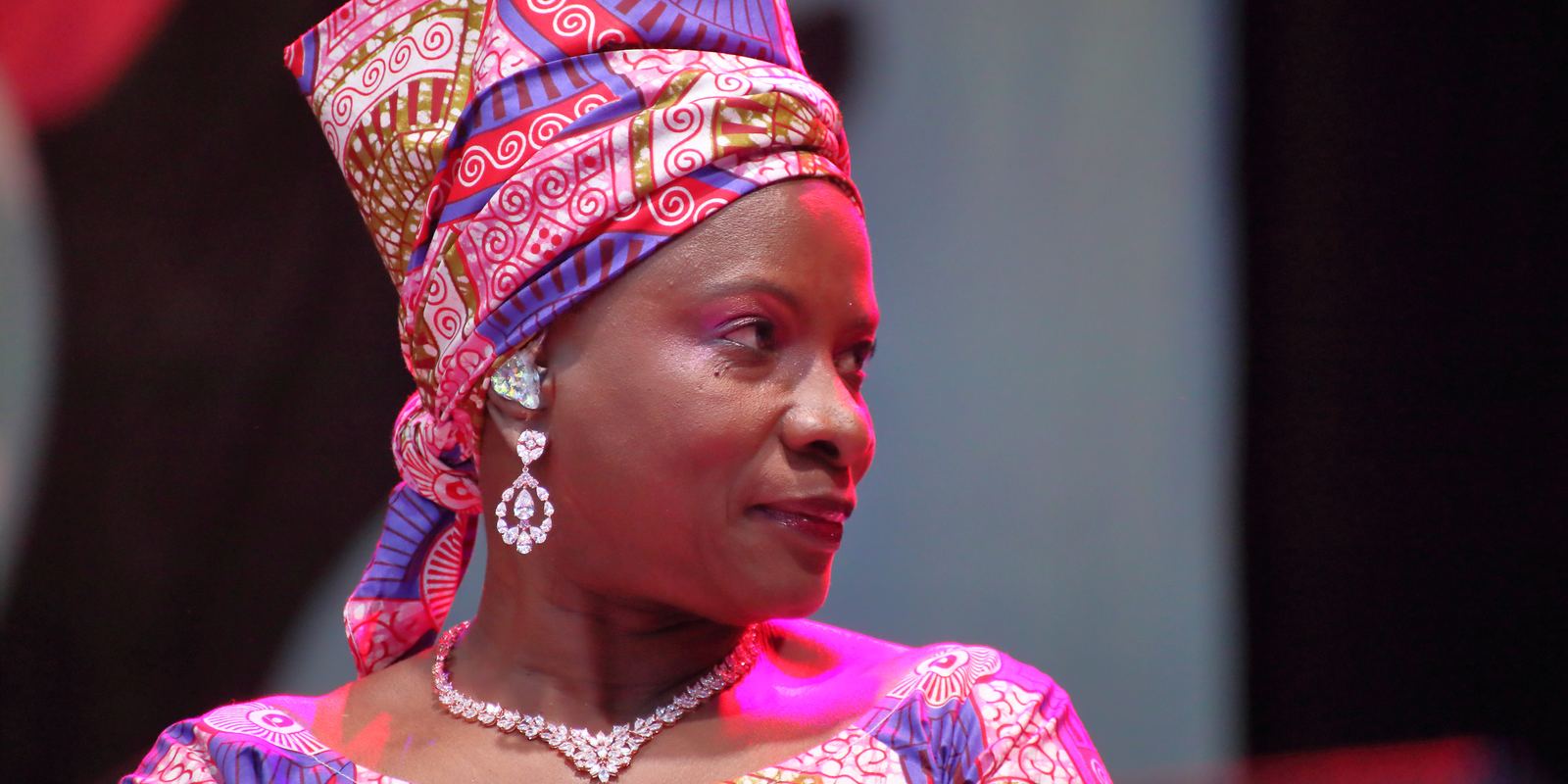 Angelique Kidjo singing on stage