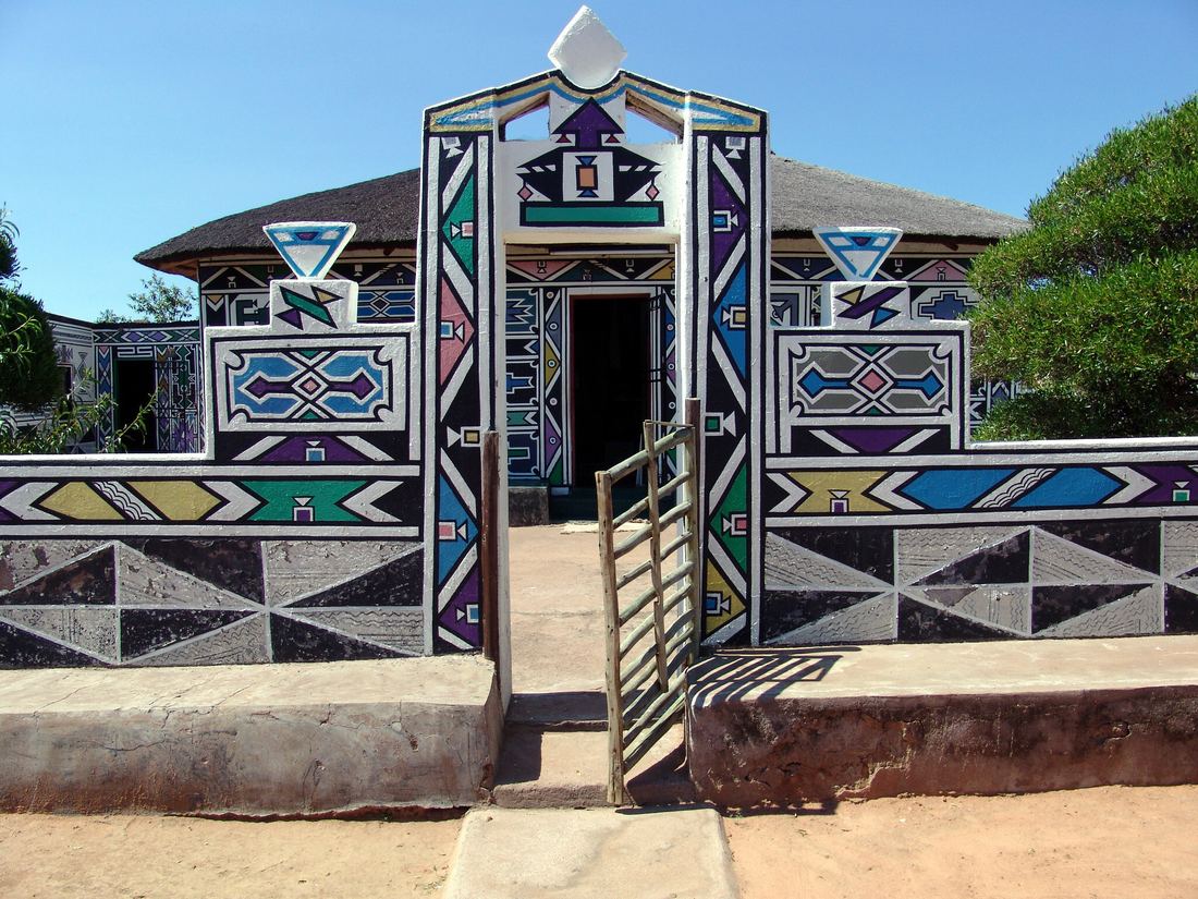 The painted gateway and walls of Esther Mahlangu's homestead in Mpumalanga, South Africa